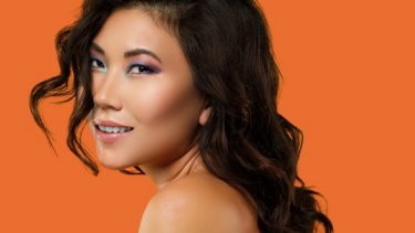 asian girl with orange background